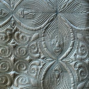 Lovely quilted Matlasse throw.